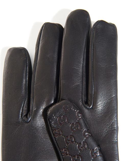 gucci black leather gloves.